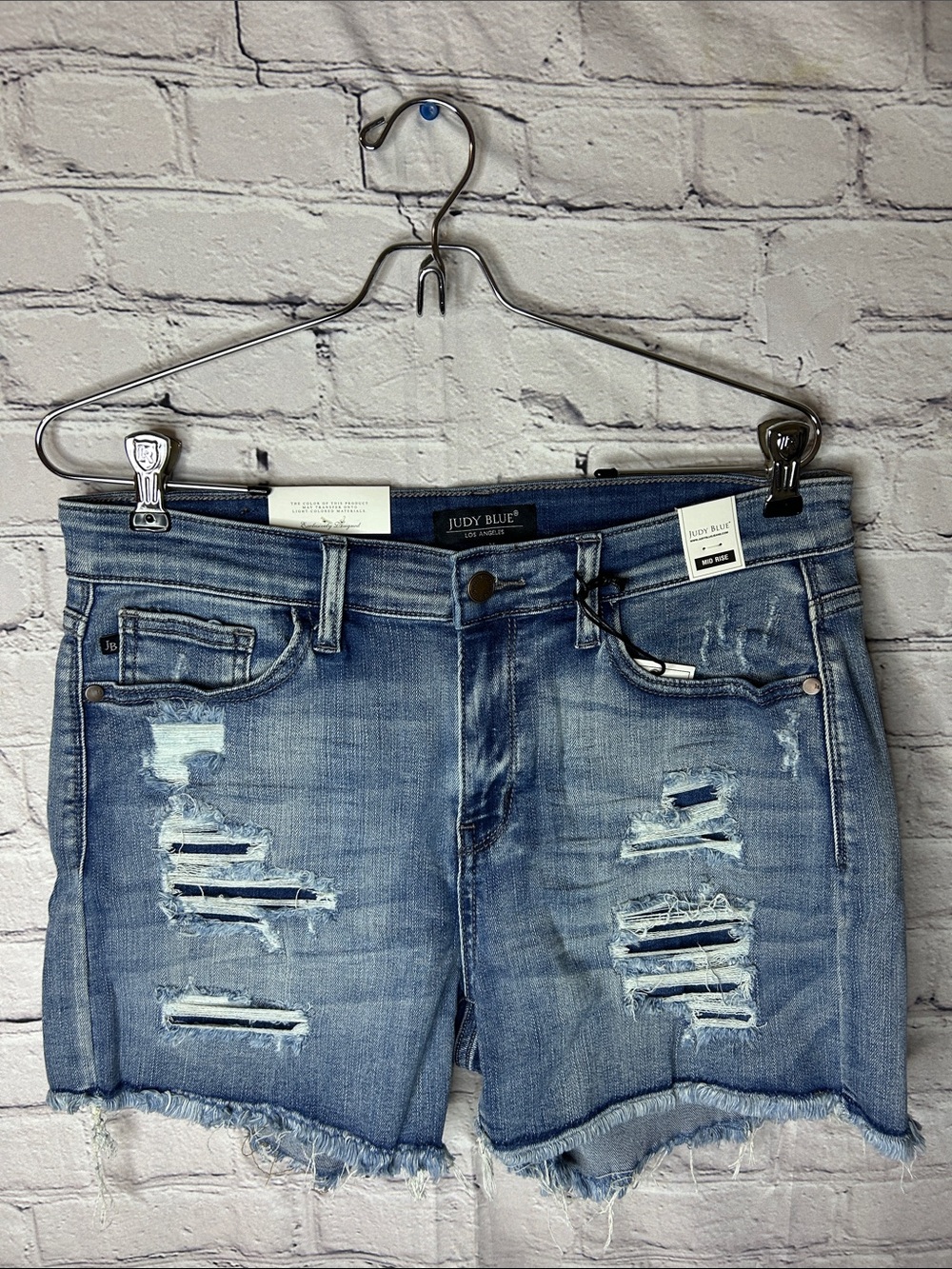Judy Blue Light Blue Distressed Denim Shorts with Frayed Hem, mid rise sizelarge